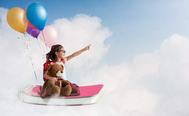 New Semester New Adventure, back to school conceptual, image of cute little girl exited to go to school expect for a playful adventure dream of going on an adventure with her teddy bear friend