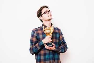 Fototapeta premium man with a golden cup