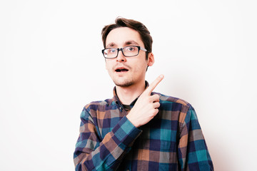 pointing up with his index finger