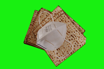 Matzah - Traditional Jewish food for Passover is covered in a mask against the Corona virus.