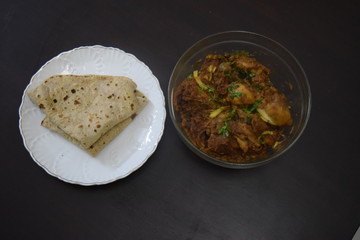 homemade spicy chicken karahi with chappatti 