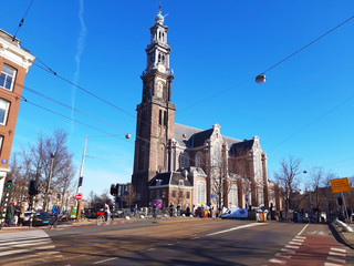 among the crowded city streets in everyday life in amsterdam