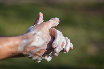 Fototapeta premium Man's hands are washed with soap. Disinfection prevention of viral diseases