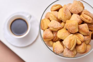homemade cookies with sugar and a cup of coffee