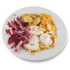 Plate of broken eggs with ham and potatoes.