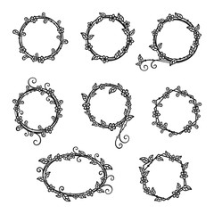 Set of decorative wreaths of twigs and flowers isolated on a white background. Vector floral frame for holiday greeting card, wedding invitation, banner, monogram, signage, labels, wedding frame