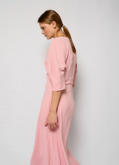 Obraz premium Fashion shooting in studio . Professional model , fashionable clothes and style, new collection. stylish look
