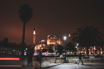 high angle on Aya Sofia by night with car light trail