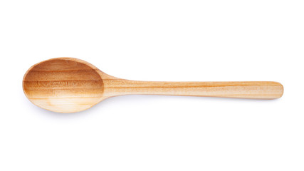 Empty wooden spoon isolated on white background. Top view of natural kitchenware
