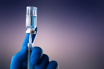 A medical hand in a glove holds an ampoule with a vaccine and a syringe with illustration
