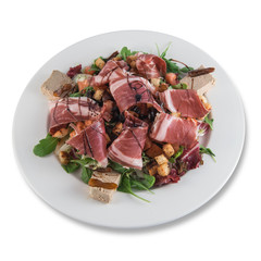Plate of lamb's lettuce salad with croutons, Iberian ham, Iberian mousse and balsamic vinegar from Modena