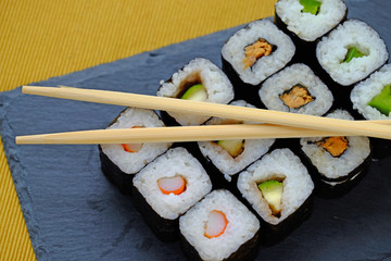 set of japanese sushi on a tray