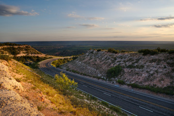 A road winds through West Texas near Palu Duro Canyon