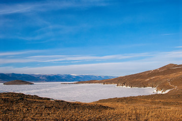 The frozen snow near the shores of lake Baikal Olkhon