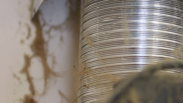 Web, dirt and dust on the vent pipe