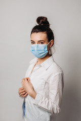 Portrait young asian woman wearing hygienic mask to prevent infection isolated on white background.