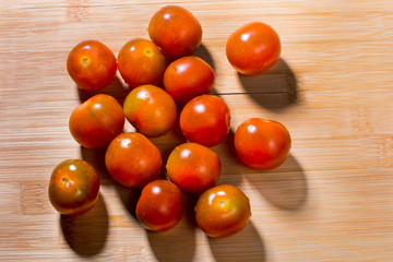 Ripe red tomatoes. Preparation of vegetable salad. 