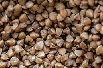 Raw buckwheat background Russian porridge 