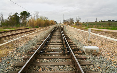Fototapeta na wymiar Change of train tracks with electric motor