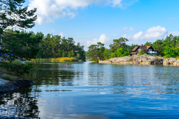 Fototapeta na wymiar Idyllic landscape view of lake banks.