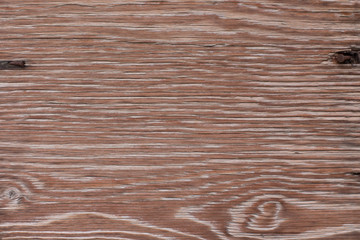 Texture of old weathered wooden fence or wall. Textured surface of grey wood (hardwood) close up....