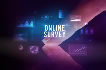 Finger touching tablet with charts and ONLINE SURVEY inscription, business concept