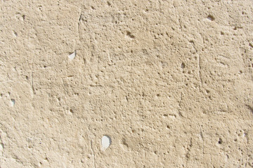 Beige texture looking for old cement with stones
