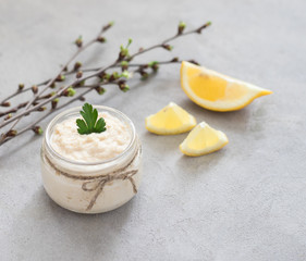 Russian appetizer white horseradish with lemon in a jar 