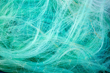 Pile of fishing nets. Detailed pattern and texture.