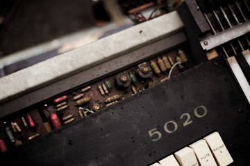 close up of old broken music keyboard