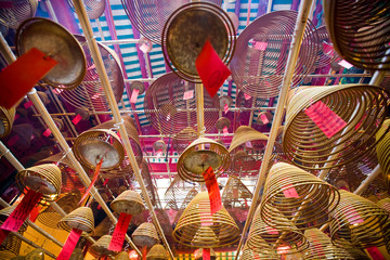 Fototapeta na wymiar Incense burners at Buddhist temple in Hong Kong