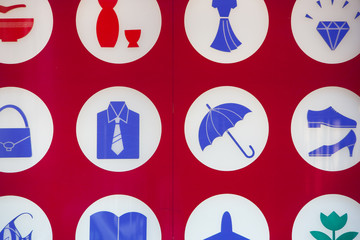 symbols of retail items on store window in Tokyo