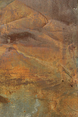 Grunge rusted metal texture. Rusty corrosion and oxidized background. Worn metallic iron panel. Vertical