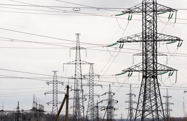 Electric high-voltage towers under voltage. Powerhouse
