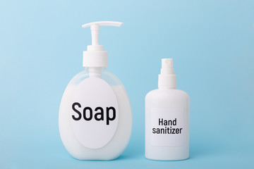 Bottle with soap and hand sanitizer in studio. Things to keep hands clean. Concept of hygiene