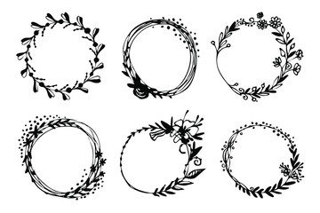 Wreaths of twigs and flowers. Vector set.