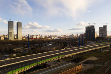 panoramic views from the drone of the railway and the highway of the big city