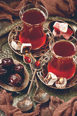 Turkish  tea with Turkish delight and traditional copper serving set