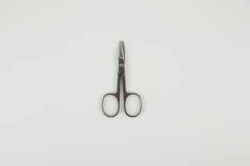 Scissors for manicure on a white background