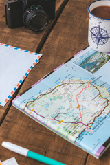 map on a table to plan and organize a trip