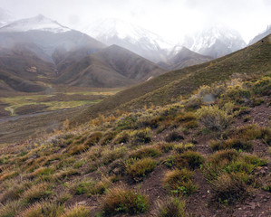 Rainy day in the Andes mountain range. Road from Argentina to Chile