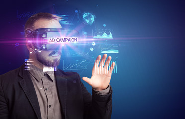 Businessman looking through Virtual Reality glasses with AD CAMPAIGN inscription, new business concept