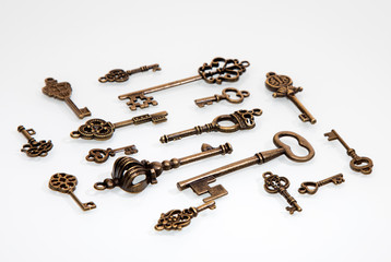 
Old keys on a white background