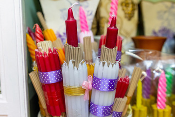Incense and candles are used in Buddhist activities in accordance with Thai beliefs.