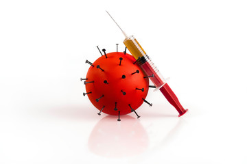 The picture shows a red Coronavirus on a white background together with a vaccine syringe. Covid-19 virus symbol
