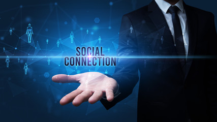 Elegant hand holding SOCIAL CONNECTION inscription, social networking concept
