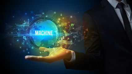Elegant hand holding MACHINE inscription, digital technology concept