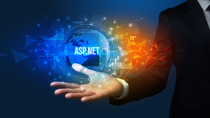 Elegant hand holding ASP.NET inscription, digital technology concept