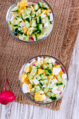 Homemade vegetable salad in glass jar