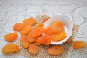 dried apricots on a wooden table